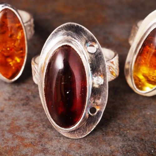 Handcrafted recycled sterling silver oval Baltic Amber rings